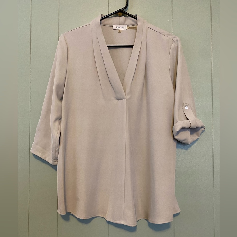 Very good quality. Light gray.